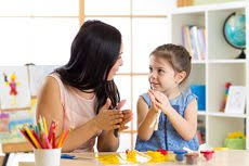 How can I teach my child to speak English